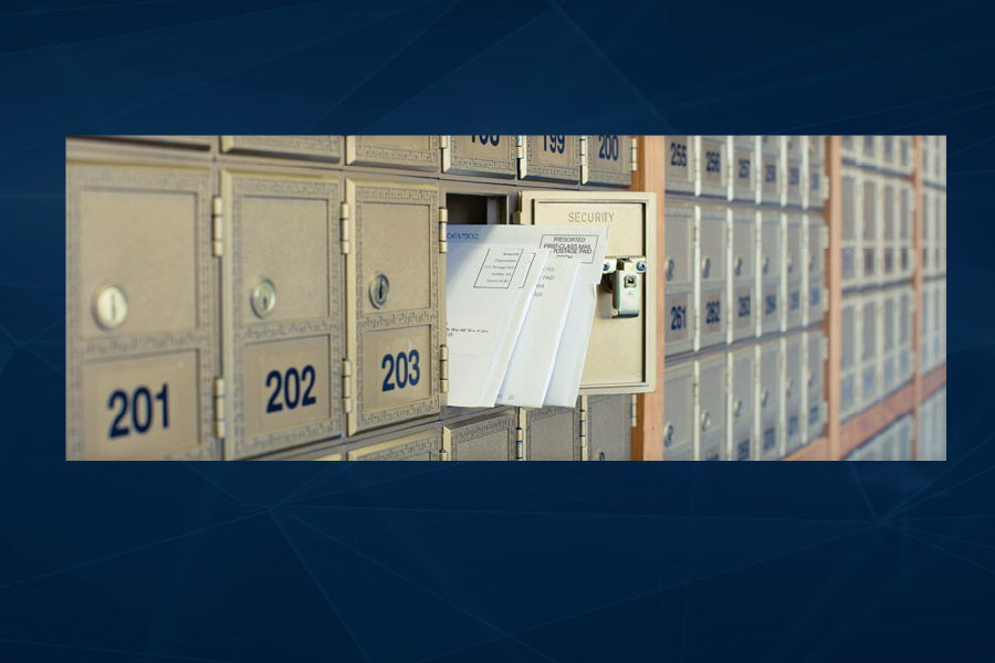 private mailboxes with one door open and letters when easy reach